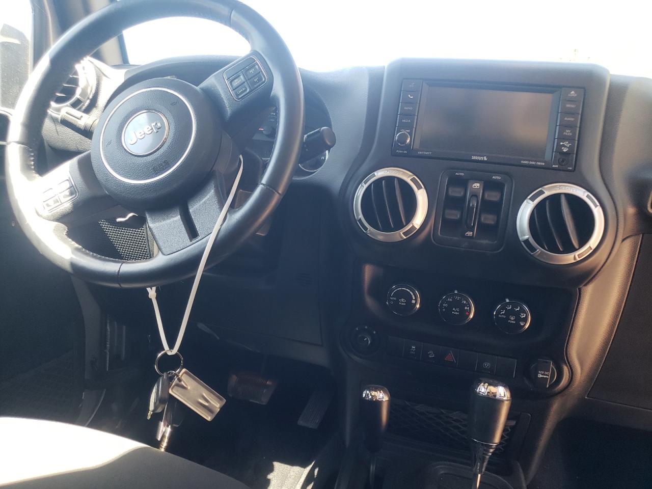 Photo 9 from auction – 2015 JEEP WRANGLER U with VIN 1C4BJWEG9FL771482