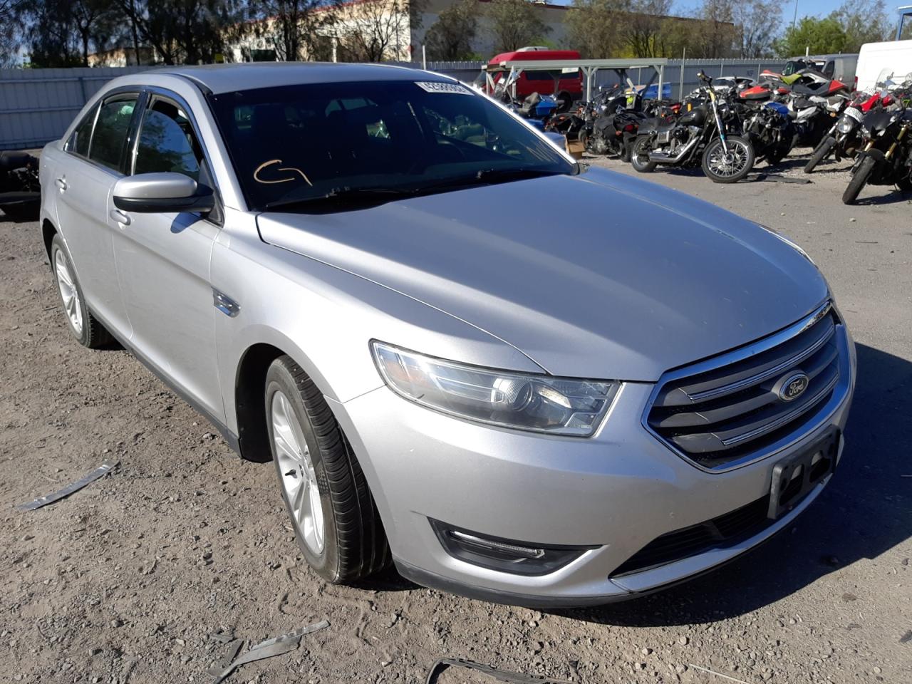 FORD TAURUS SEL 2014 with VIN 1FAHP2E81EG171465 - Photo from auction