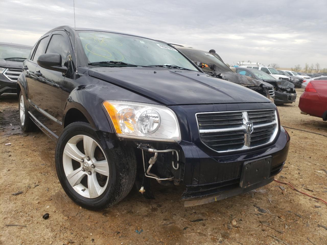 DODGE CALIBER MA 2011 with VIN 1B3CB3HA5BD209303 - Photo from auction