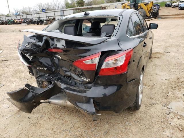 Photo 9 from auction – 2014 FORD FOCUS with VIN 1FADP3J20EL117703