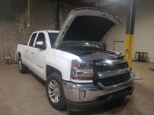 CHEVROLET SILVERADO 2018 with VIN 1GCVKREC7JZ236052 - Photo from auction