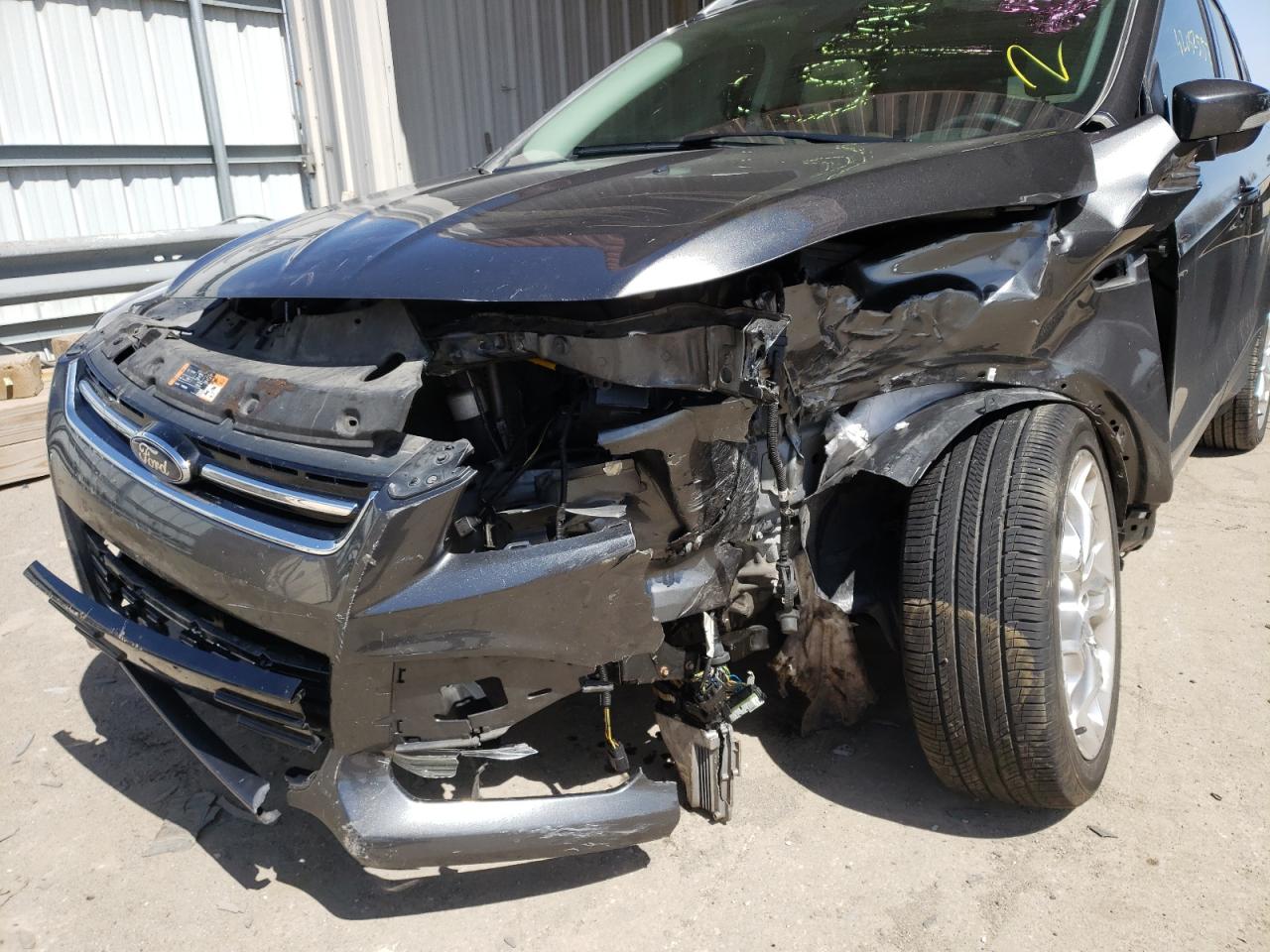 Photo 9 from auction – 2015 FORD ESCAPE TIT with VIN 1FMCU0J96FUB43126