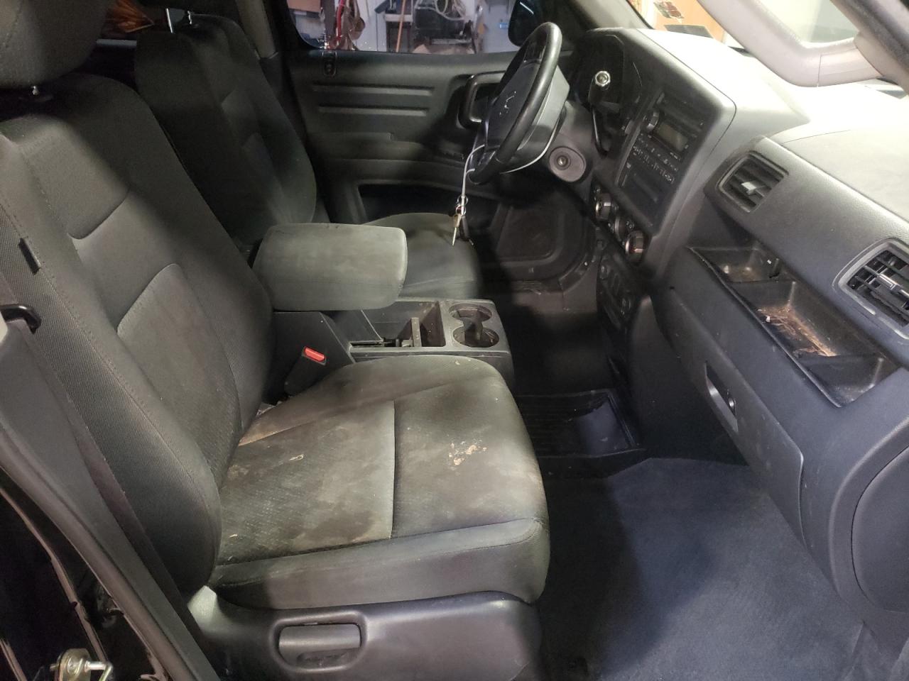 Photo 5 from auction – 2014 HONDA RIDGELINE with VIN 5FPYK1F76EB014864