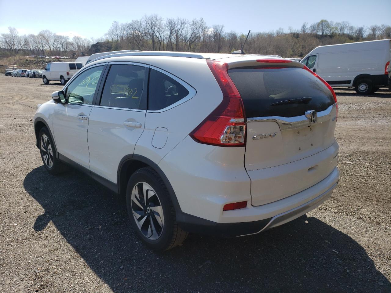 Photo 3 from auction – 2015 HONDA CR-V TOURI with VIN 5J6RM4H99FL024854