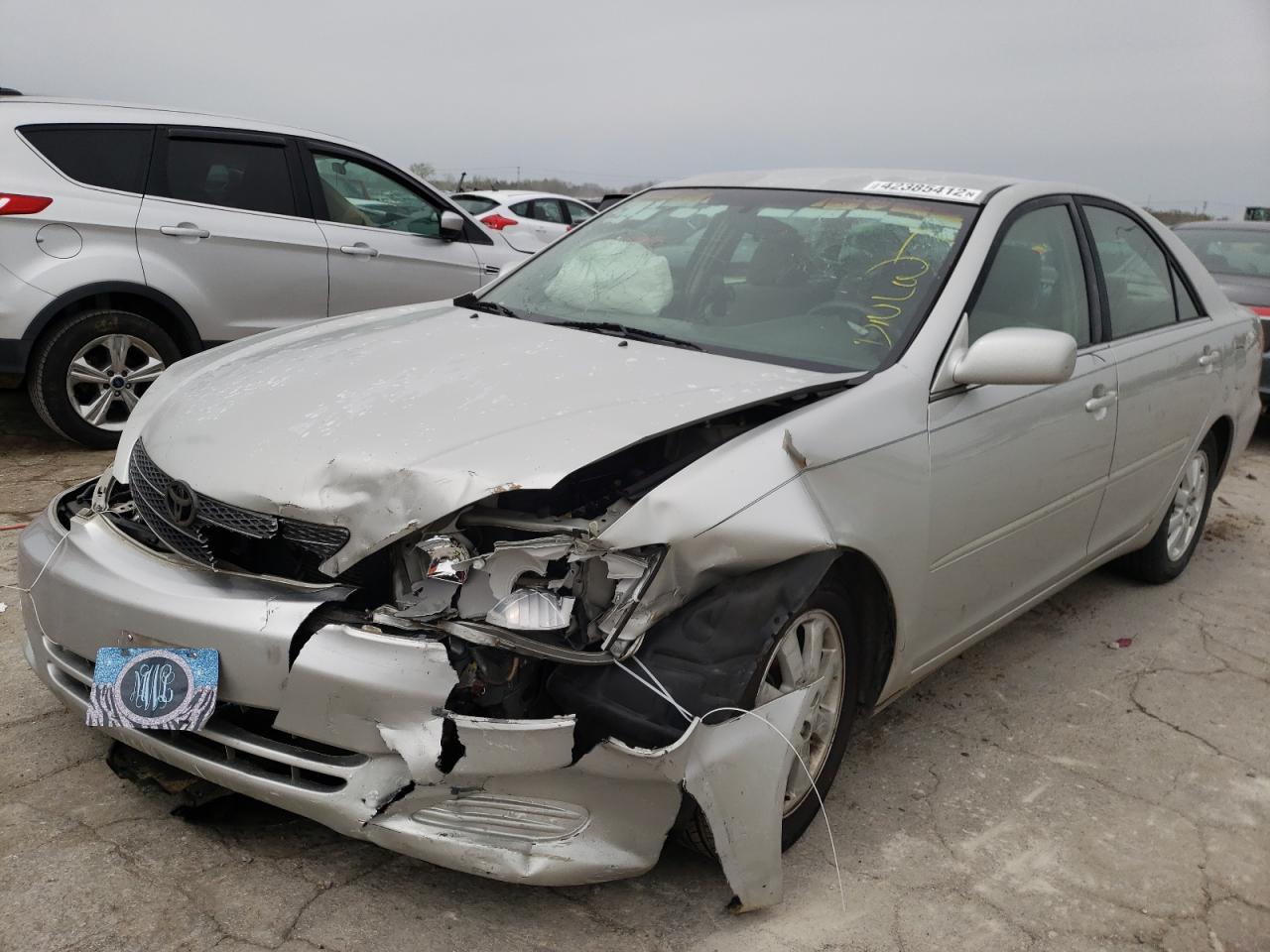 Photo 9 from auction – 2003 TOYOTA CAMRY LE with VIN 4T1BE32K13U699805