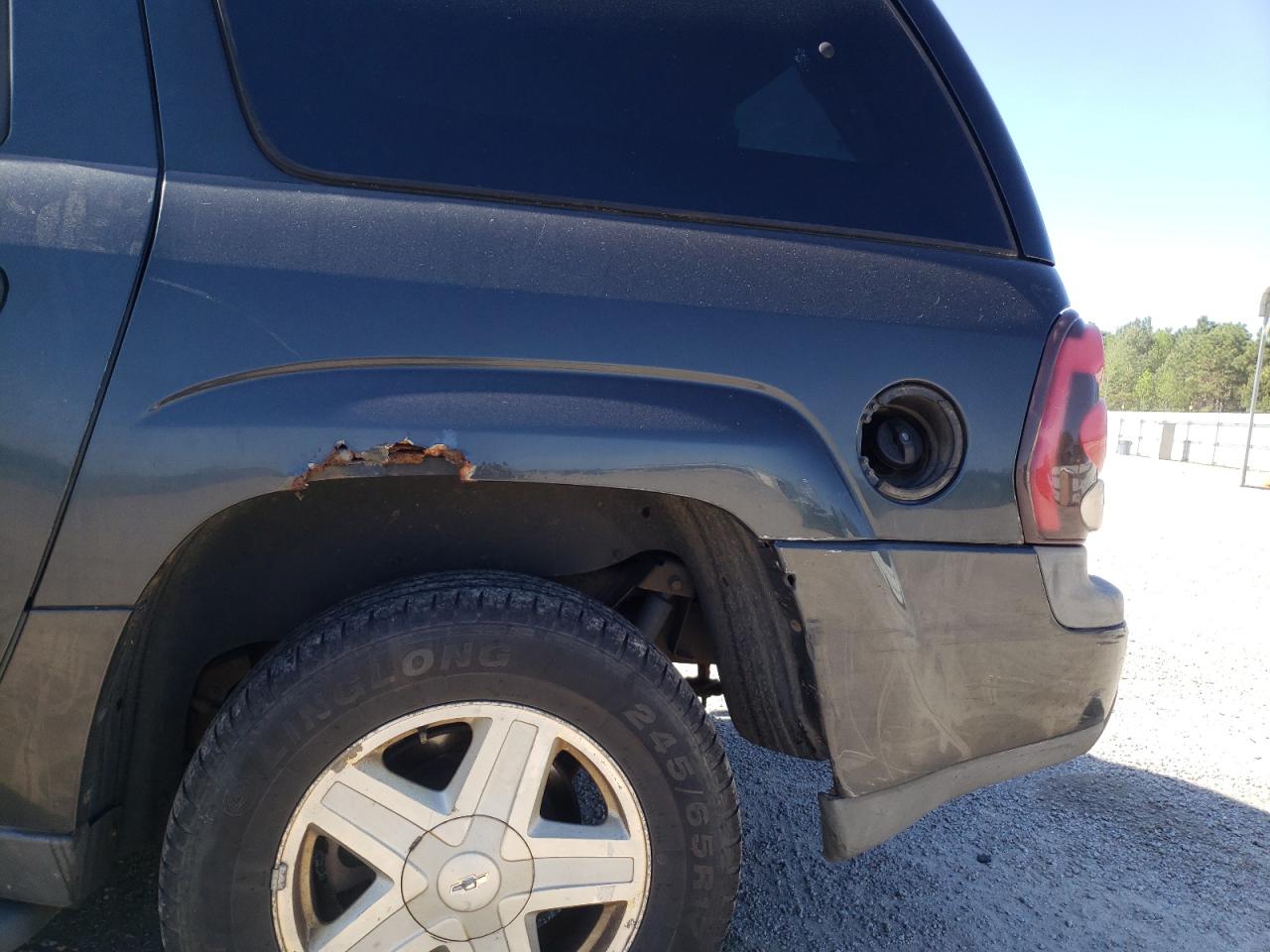 Photo 9 from auction – 2003 CHEVROLET TRAILBLAZE with VIN 1GNET16S136145715