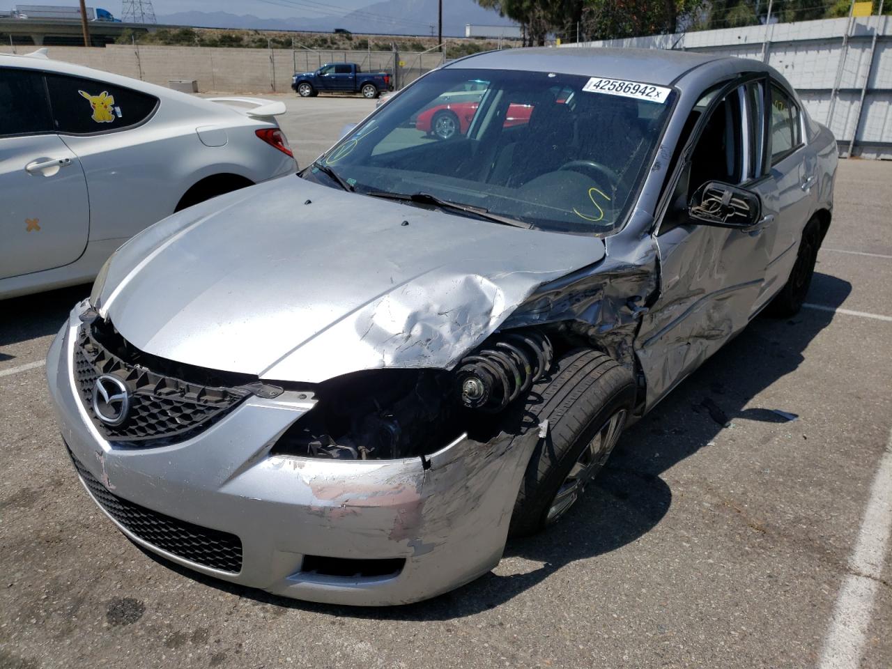 Photo 2 from auction – 2009 MAZDA 3 I with VIN JM1BK32F591250556