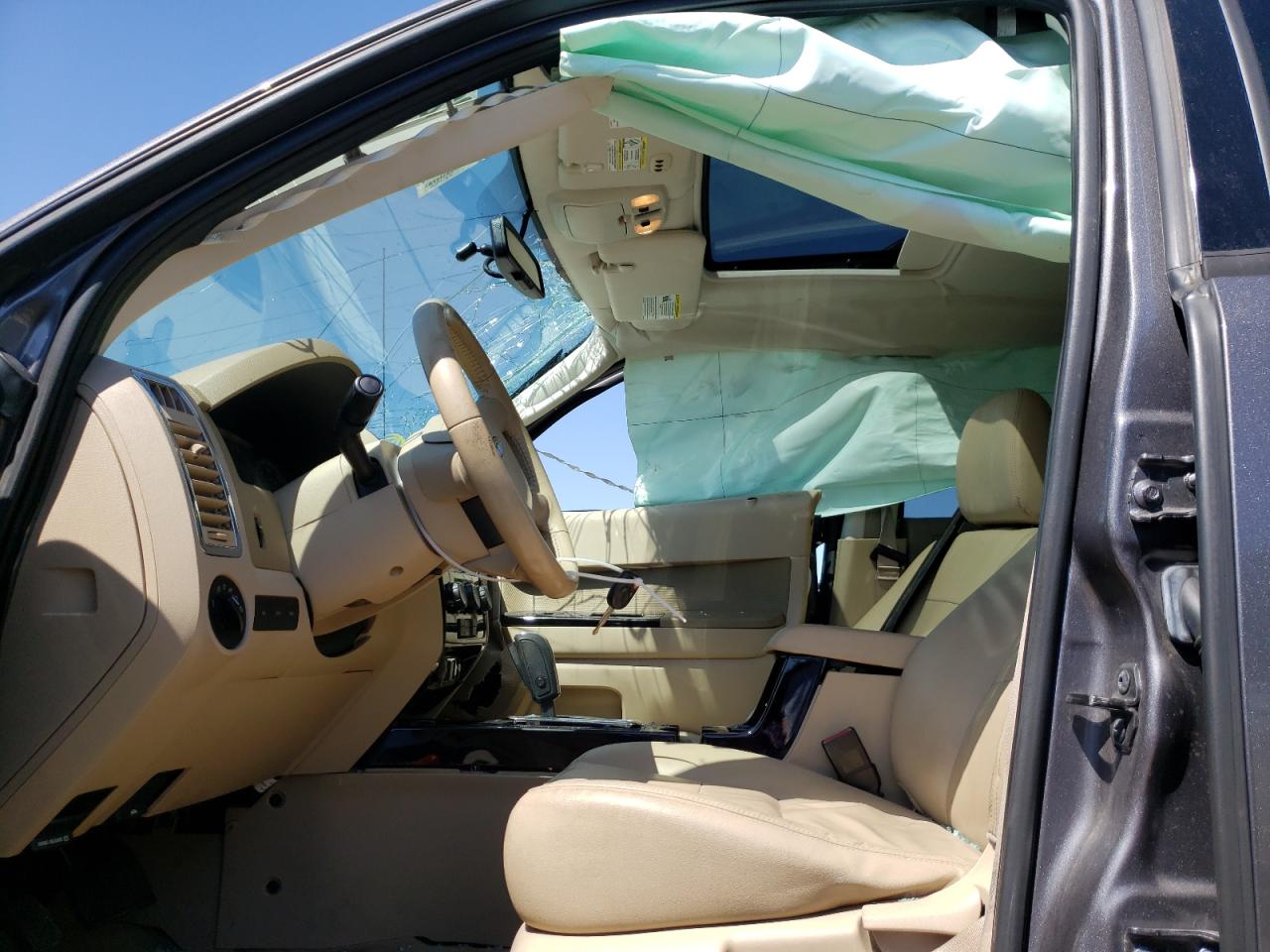 Photo 5 from auction – 2011 FORD ESCAPE LIM with VIN 1FMCU9EG6BKA60220