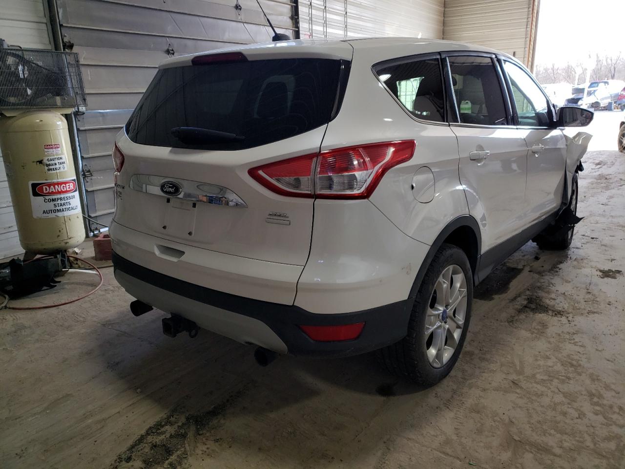 Photo 4 from auction – 2013 FORD ESCAPE SEL with VIN 1FMCU9H97DUB09378