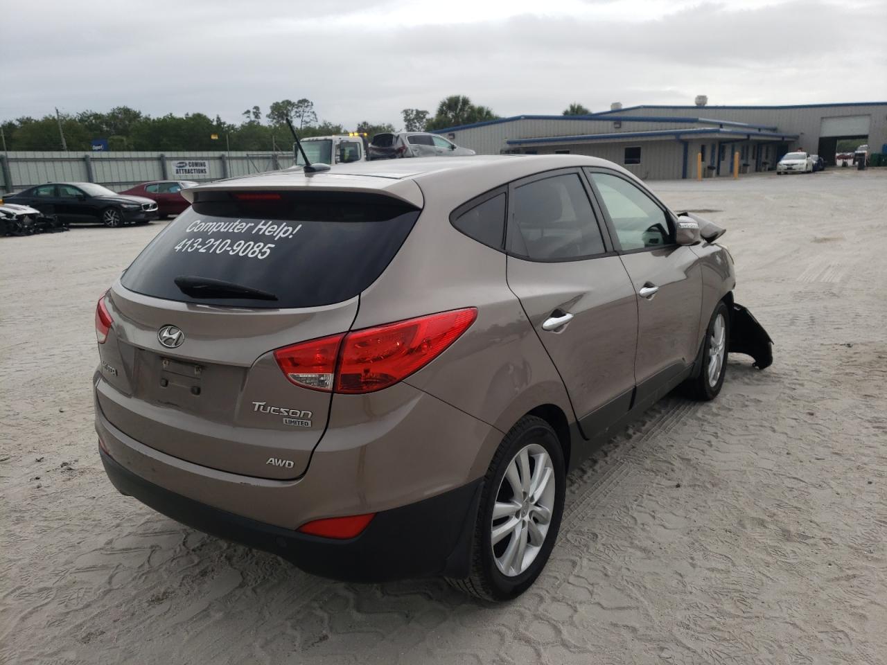 Photo 4 from auction – 2012 HYUNDAI TUCSON GLS with VIN KM8JUCAC3CU543113
