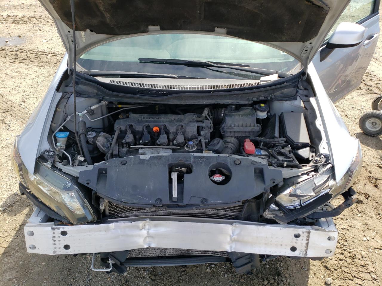 Photo 7 from auction – 2022 HONDA CIVIC LX with VIN 2HGFB2F51DH602136