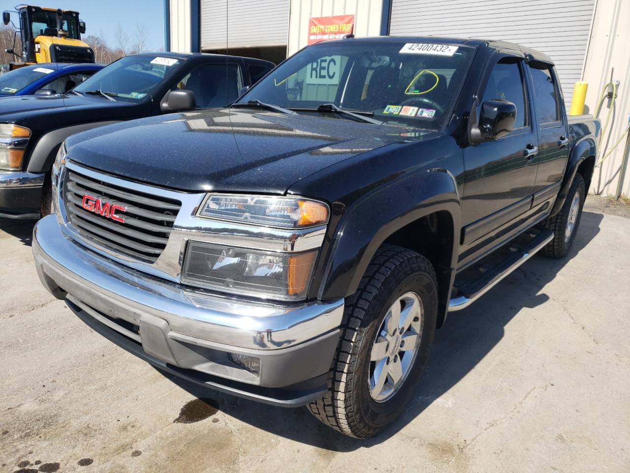 Photo 2 from auction – 2011 GMC CANYON SLE with VIN 1GTH6MFE8B8108575