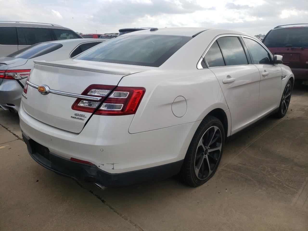 Photo 4 from auction – 2015 FORD TAURUS SEL with VIN 1FAHP2E81FG104222