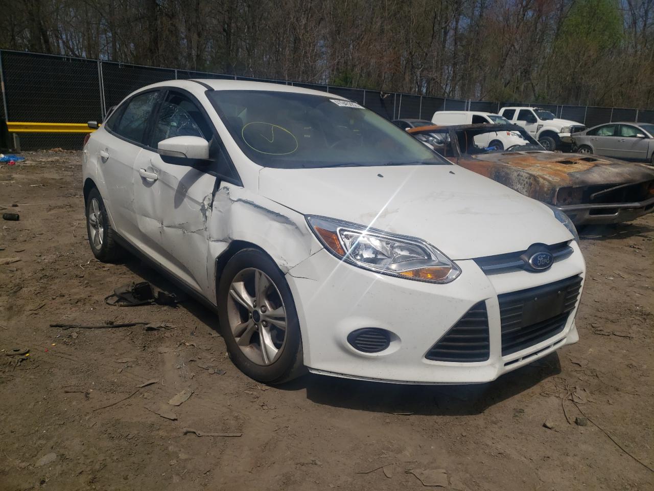 FORD FOCUS SE 2014 with VIN 1FADP3F28EL408197 - Photo from auction
