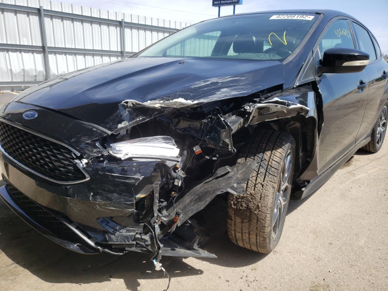 Photo 9 from auction – 2016 FORD FOCUS SE with VIN 1FADP3K21GL314770