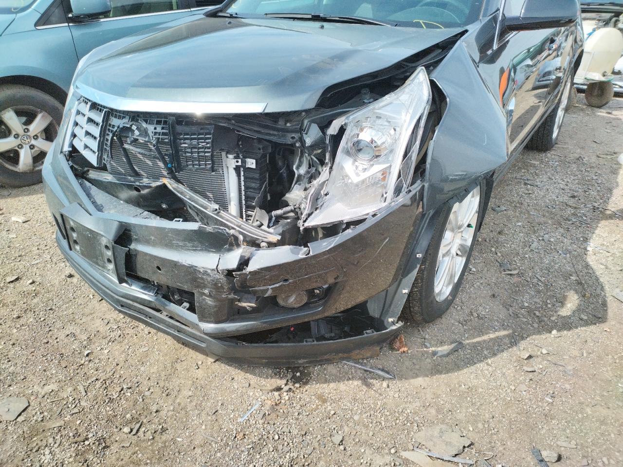 Photo 9 from auction – 2014 CADILLAC SRX PERFOR with VIN 3GYFNFE35ES664029