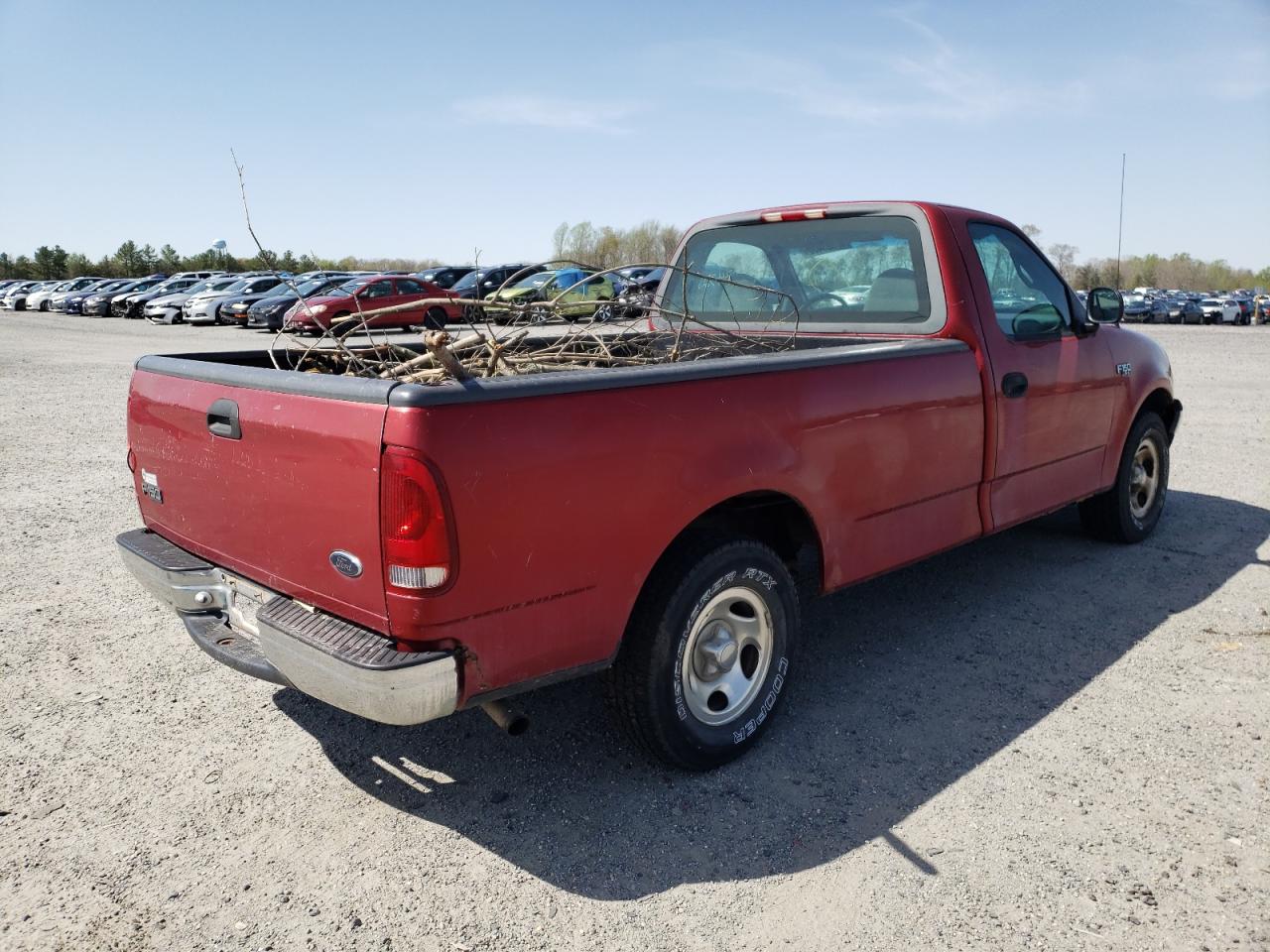 Photo 4 from auction – 2000 FORD F150 with VIN 1FTZF1723YNA75857