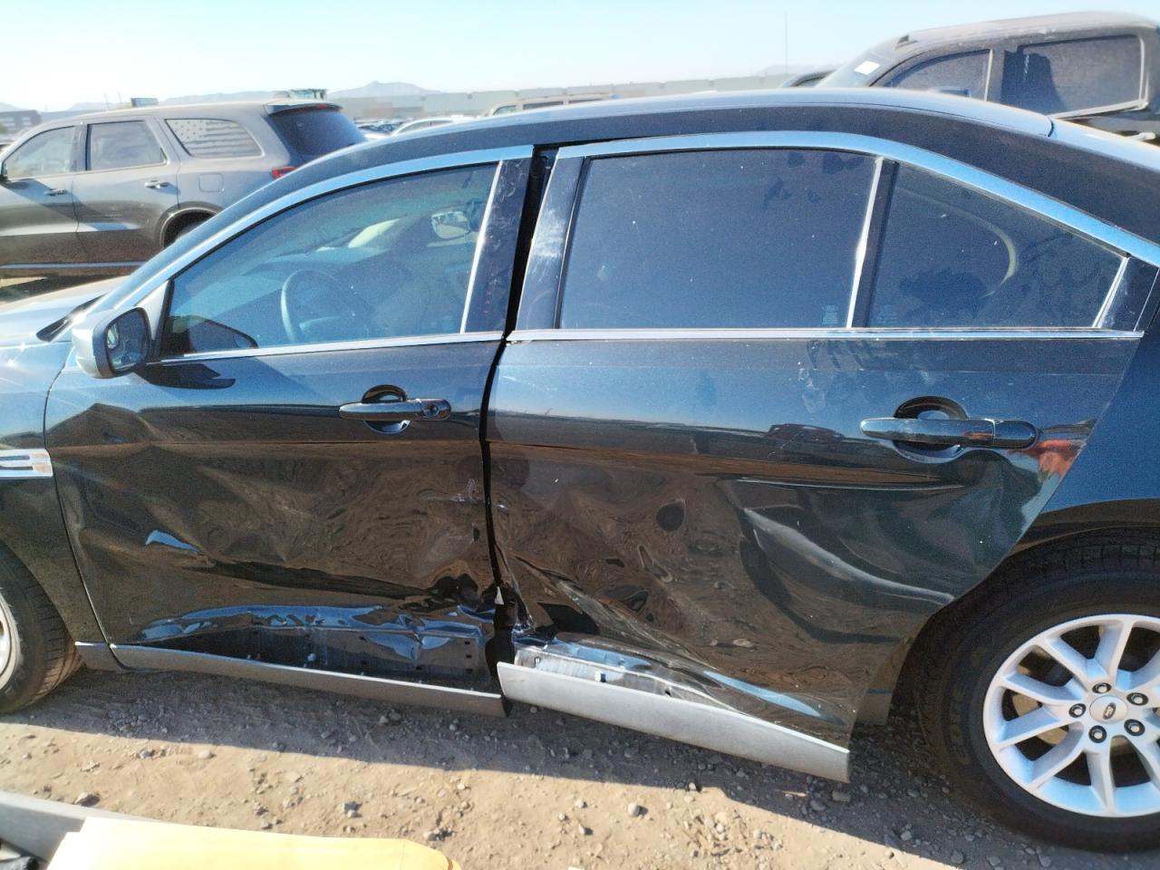 Photo 9 from auction – 2014 FORD TAURUS SE with VIN 1FAHP2D8XEG178514