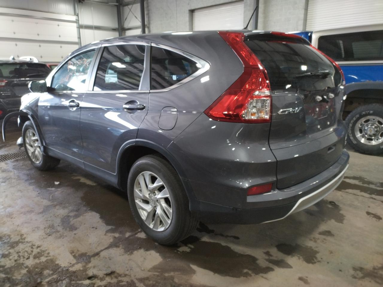 Photo 3 from auction – 2015 HONDA CR-V EX with VIN 5J6RM4H59FL118682