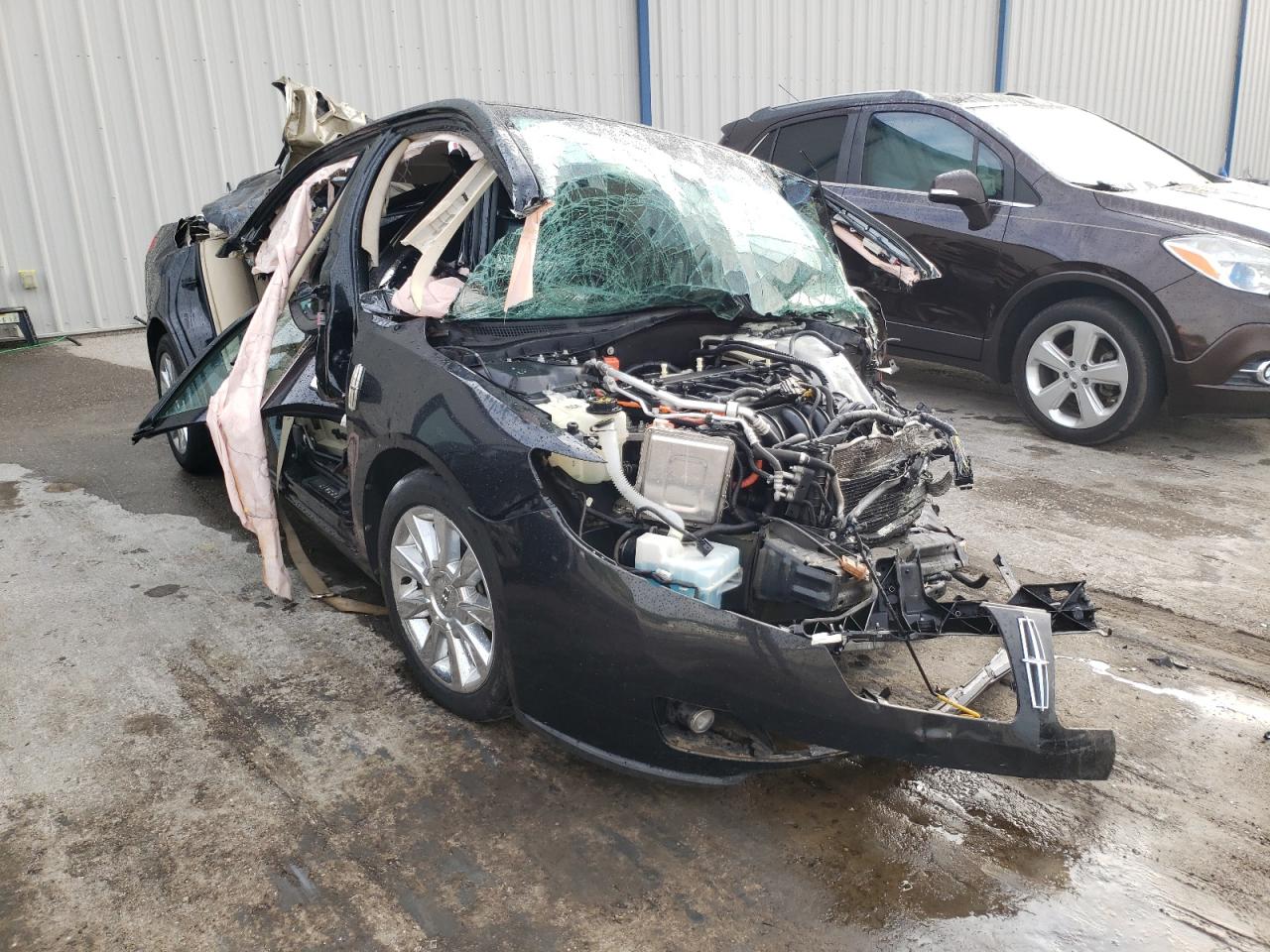 LINCOLN MKZ HYBRID 2011 with VIN 3LNDL2L39BR752997 - Photo from auction