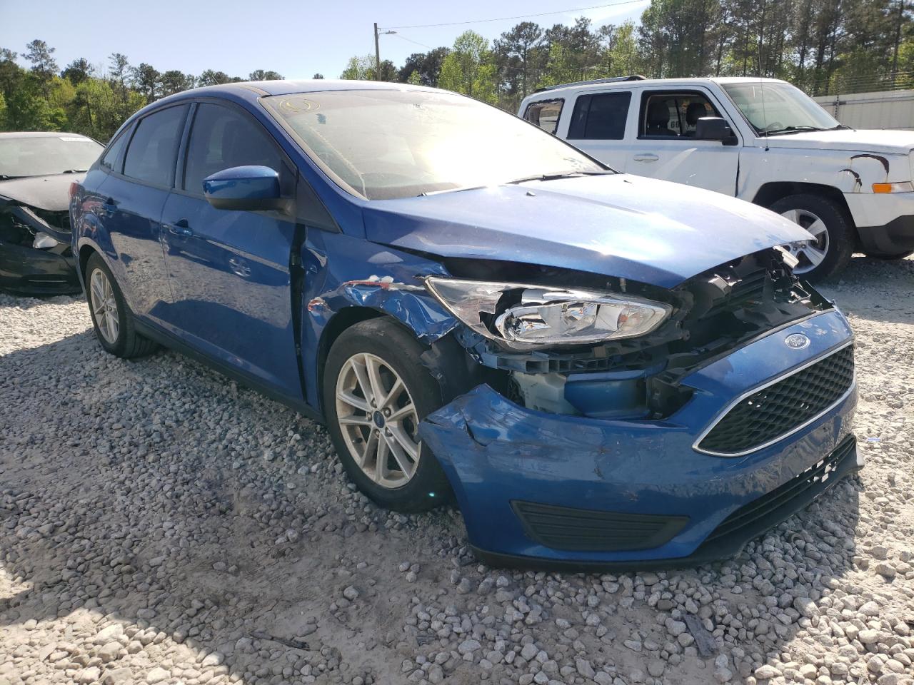 FORD FOCUS SE 2018 مع رقم تعريف المركبة 1FADP3FE8JL264901 - صورة من المزاد