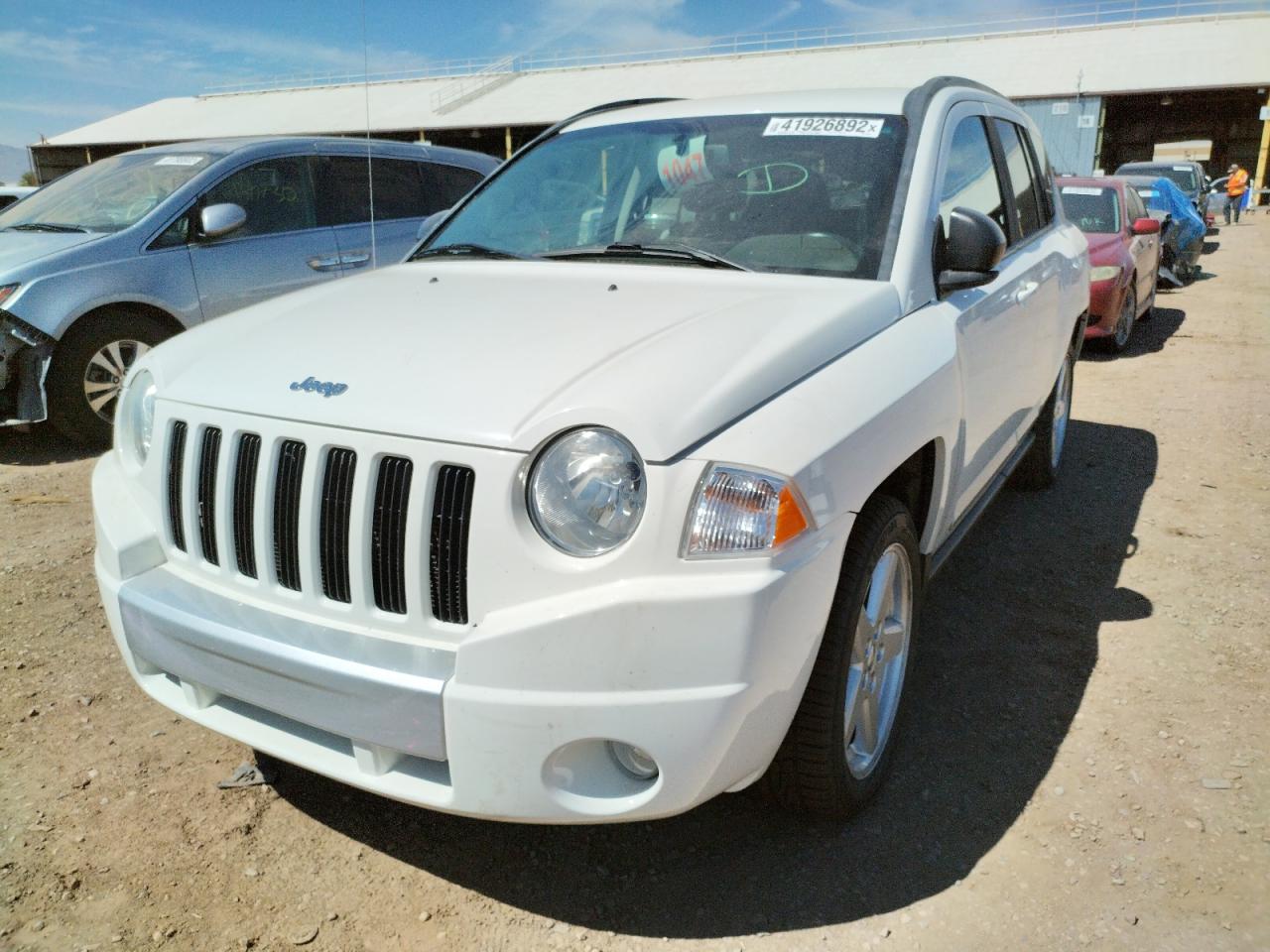 Photo 2 from auction – 2010 JEEP COMPASS LI with VIN 1J4NT5FB7AD538153