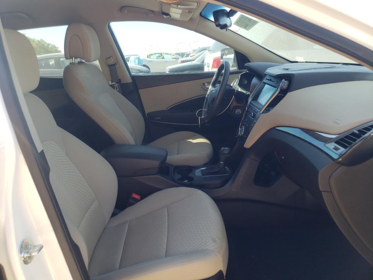 Photo 5 from auction – 2017 HYUNDAI SANTA FE S with VIN 5NMZU3LB7HH042882
