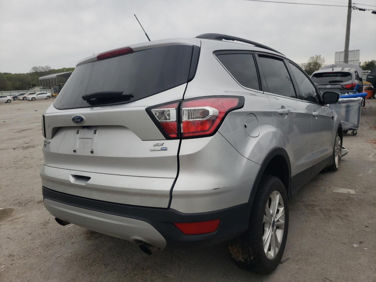 Photo 4 from auction – 2017 FORD ESCAPE SE with VIN 1FMCU9GD1HUC19886