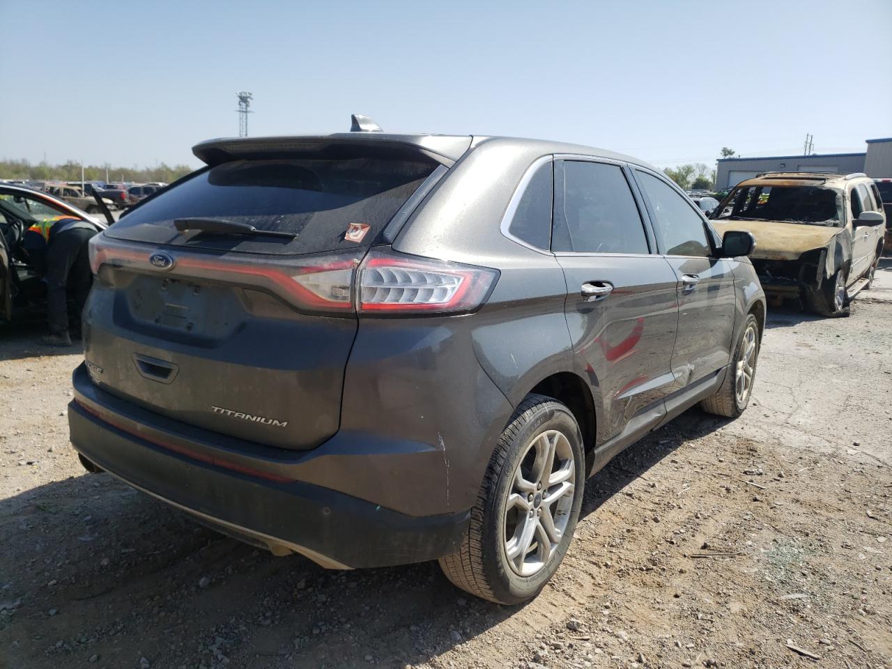 Photo 4 from auction – 2016 FORD EDGE TITAN with VIN 2FMPK3K82GBB12297