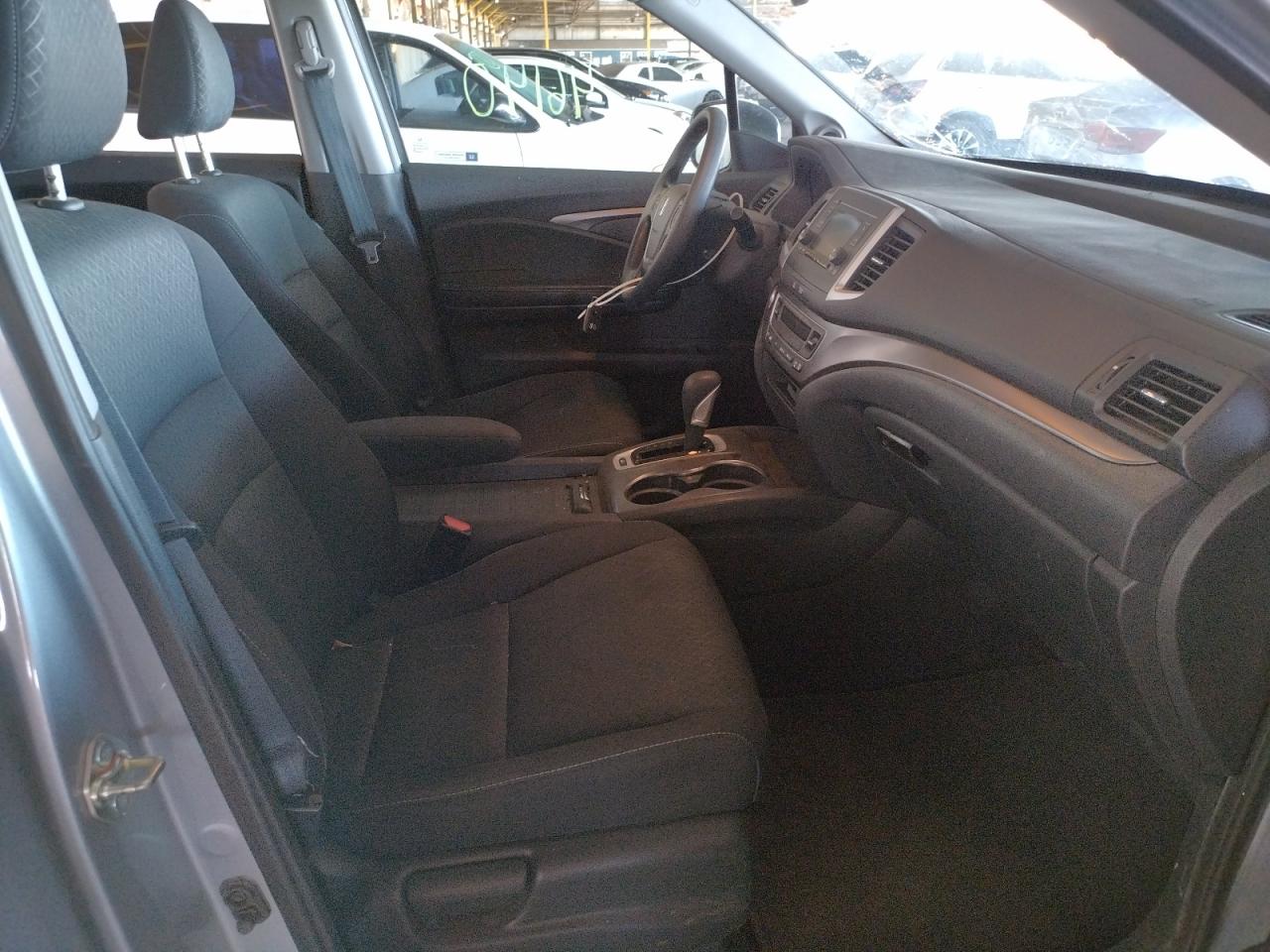 Photo 5 from auction – 2017 HONDA RIDGELINE with VIN 5FPYK3F27HB026929