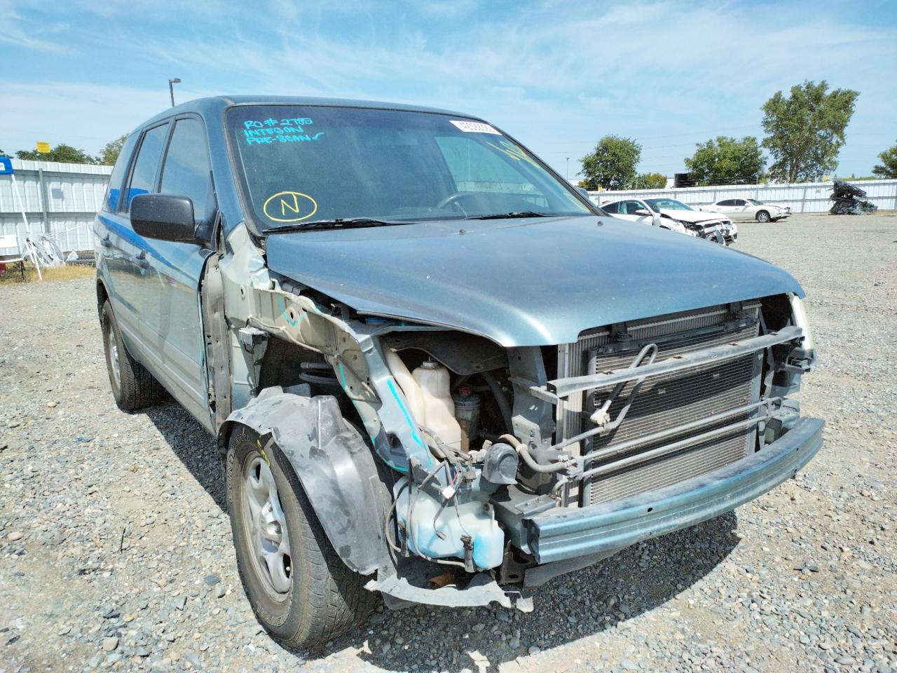 Photo 9 from auction – 2005 HONDA PILOT LX with VIN 2HKYF181X5H568352
