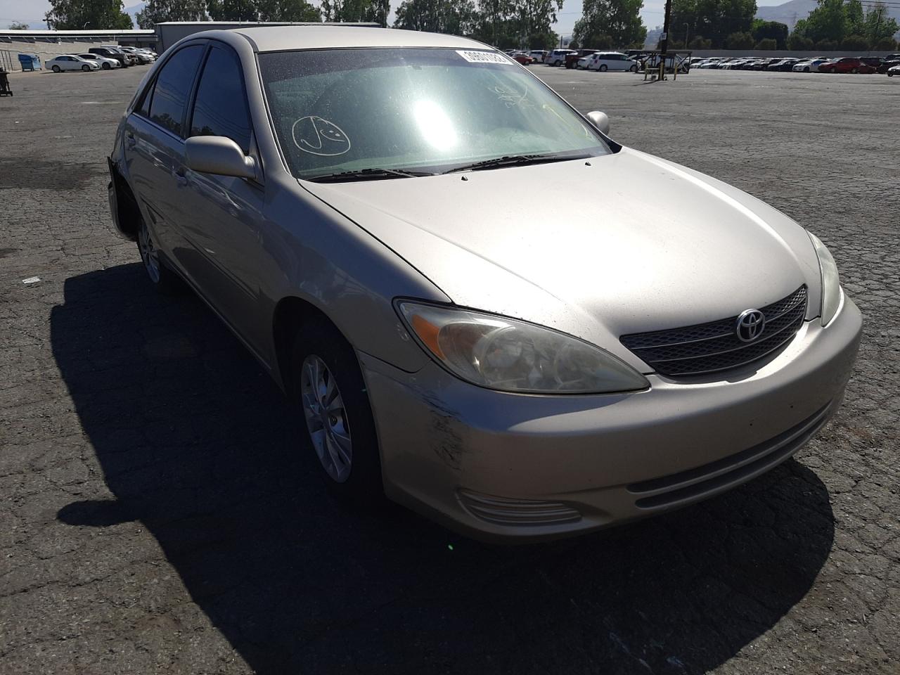 TOYOTA CAMRY LE 2004 with VIN 4T1BF32K94U064104 - Photo from auction