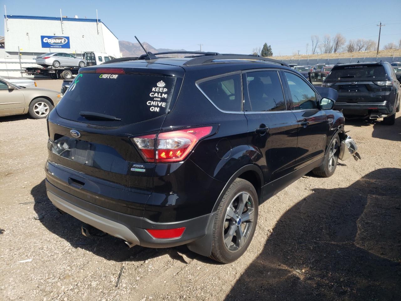 Photo 4 from auction – 2018 FORD ESCAPE SEL with VIN 1FMCU0HD7JUB06234