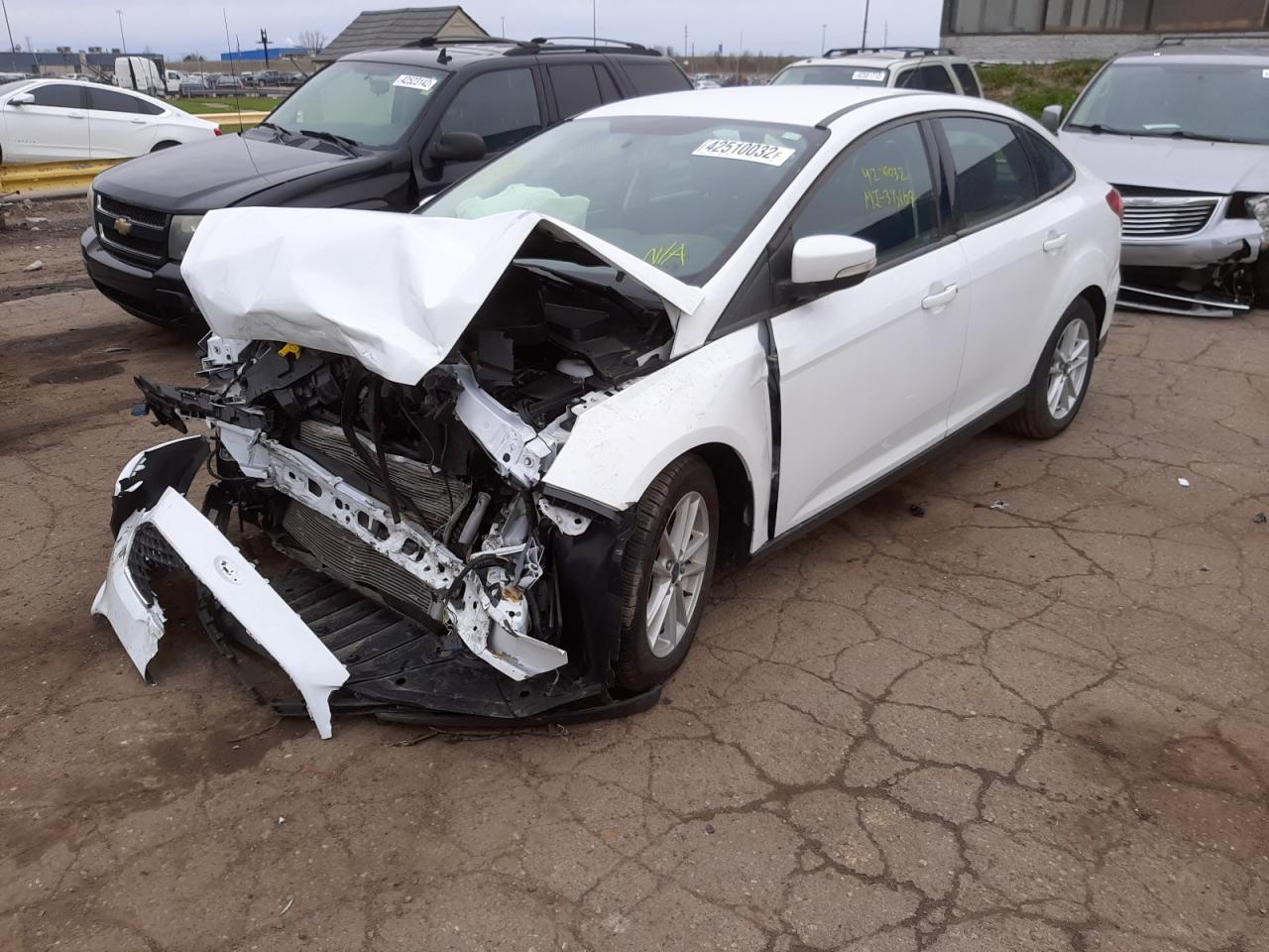 Photo 2 from auction – 2017 FORD FOCUS SE with VIN 1FADP3F24HL283526