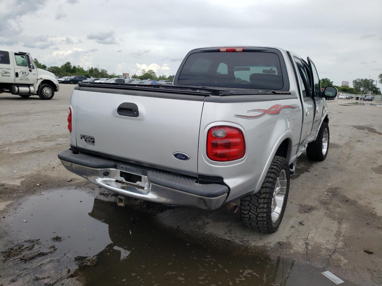 Photo 4 from auction – 2003 FORD F150 SUPER with VIN 1FTRW08603KD59453