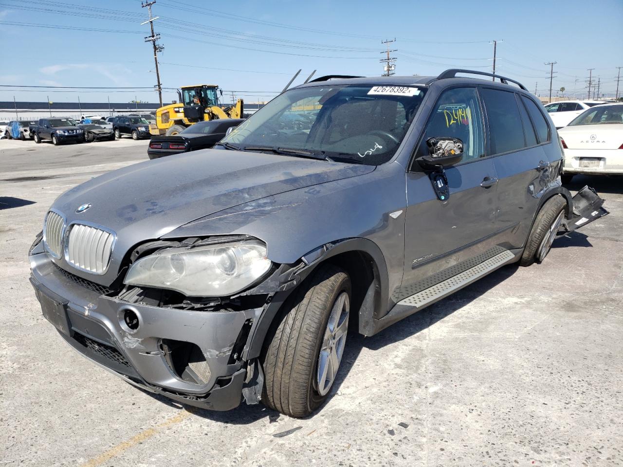 Photo 2 from auction – 2011 BMW X5 XDRIVE3 with VIN 5UXZW0C57BL663000