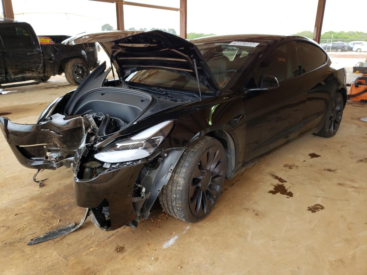 Photo 2 from auction – 2021 TESLA MODEL 3 with VIN 5YJ3E1EC3MF976031