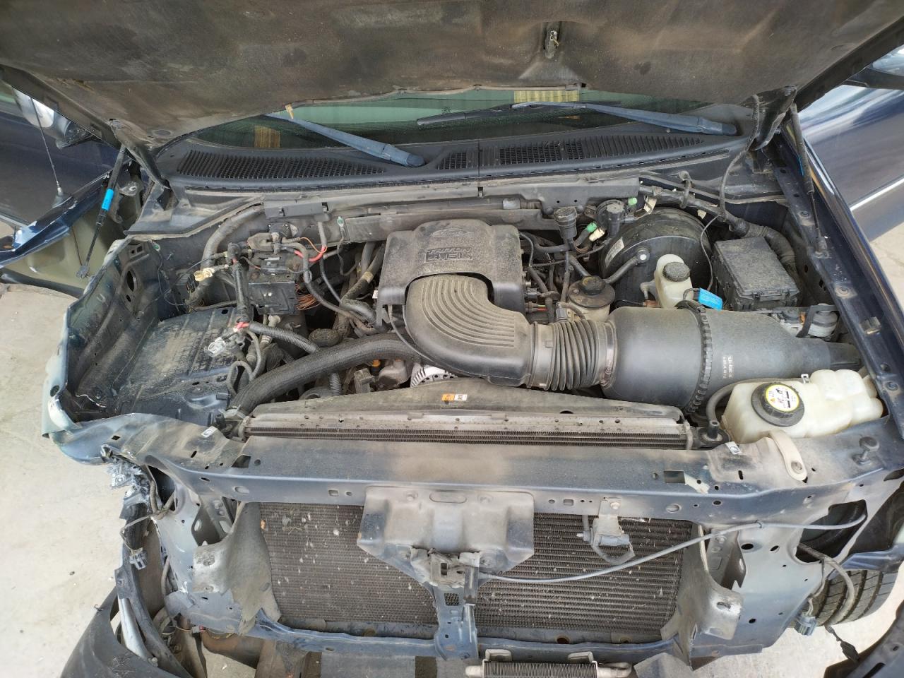 Photo 7 from auction – 2002 FORD F150 with VIN 1FTRX17WX2NA72283
