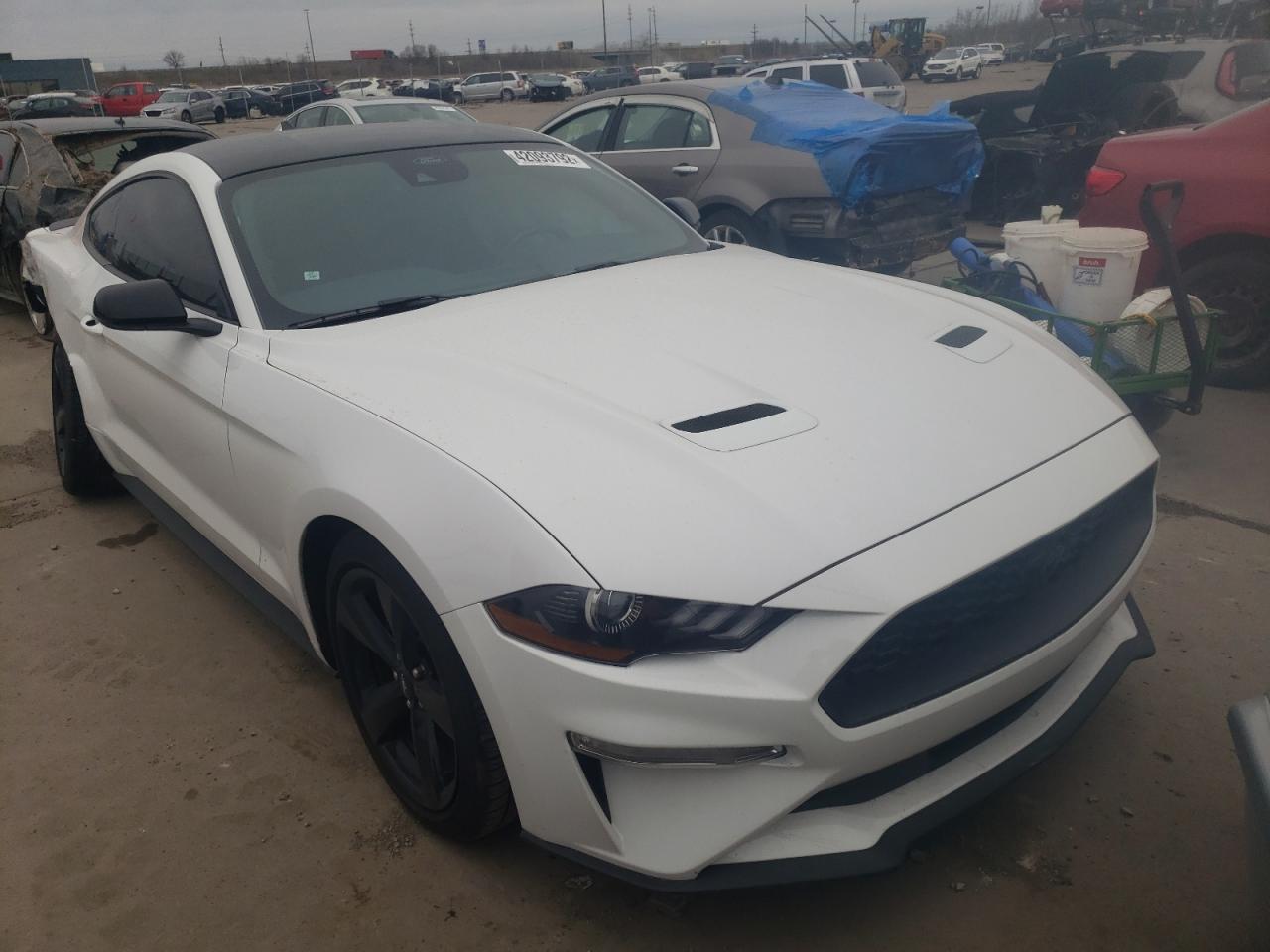 FORD MUSTANG 2021 with VIN 1FA6P8TH3M5117737 - Photo from auction