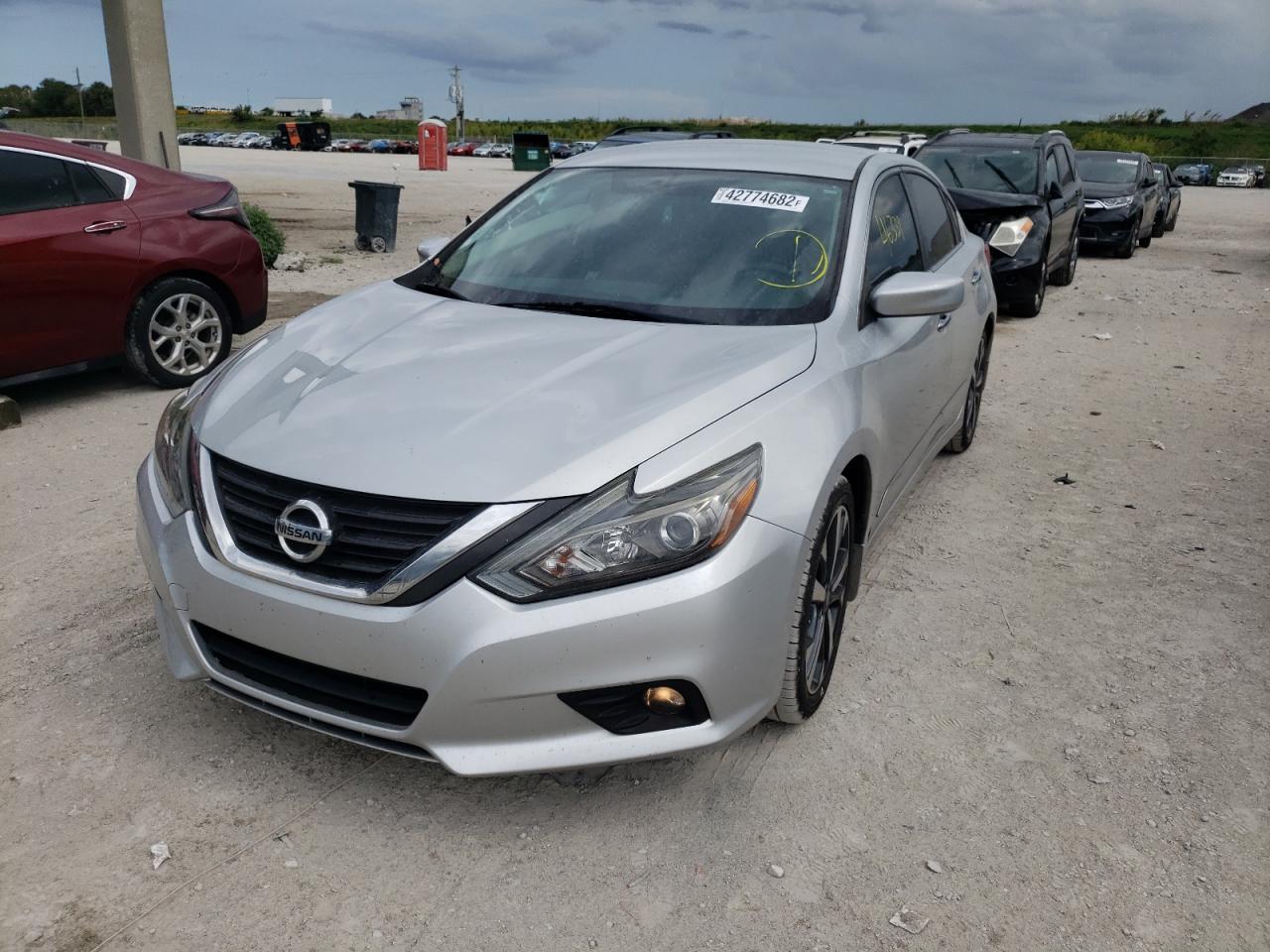 Photo 2 from auction – 2016 NISSAN ALTIMA 2.5 with VIN 1N4AL3AP9GC247718