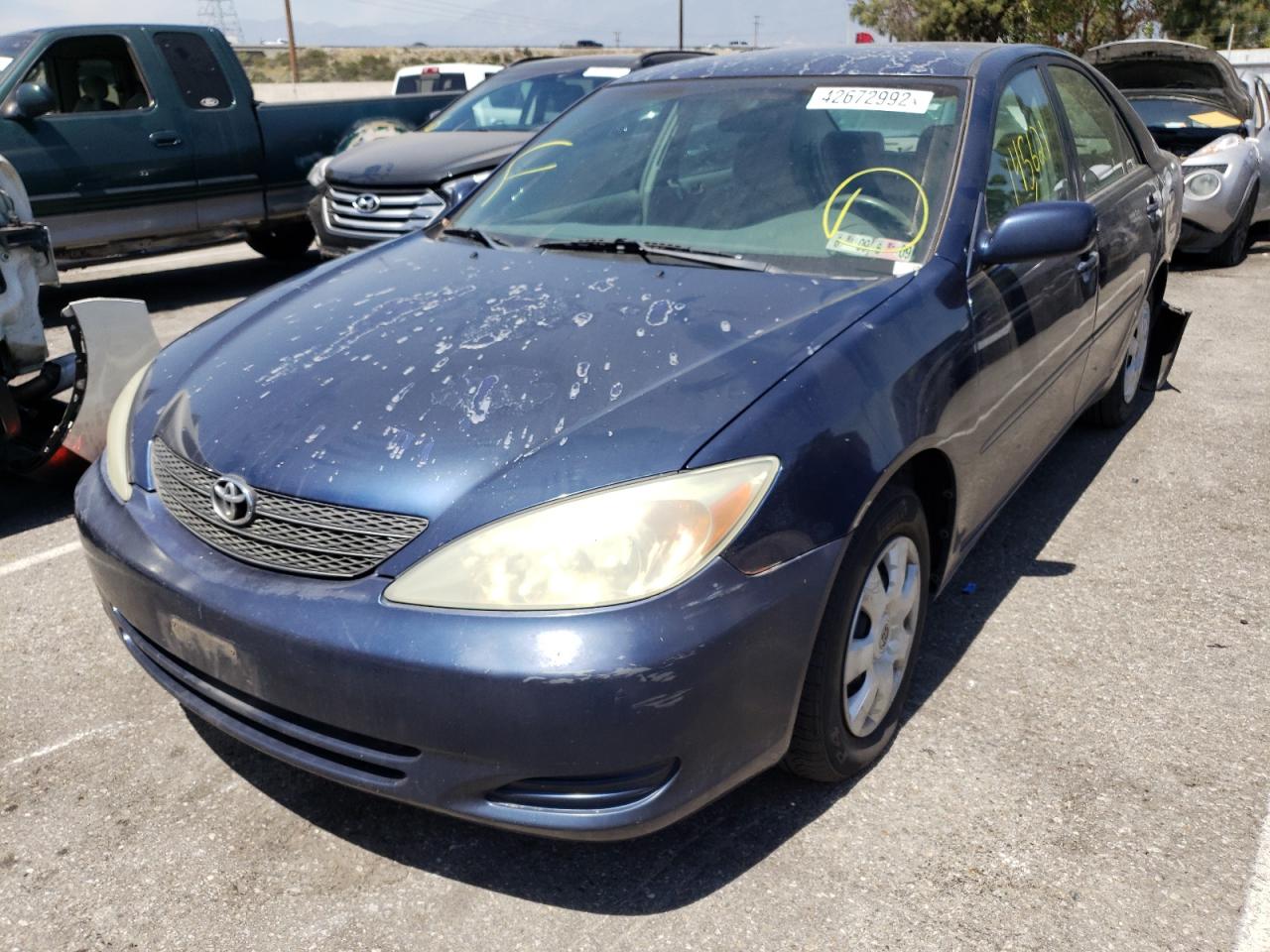 Photo 2 from auction – 2002 TOYOTA CAMRY LE with VIN 4T1BE32K52U586809