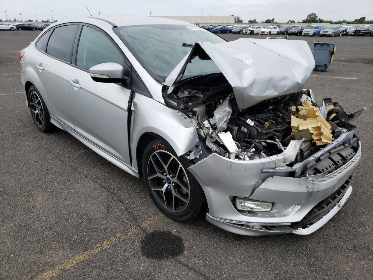 FORD FOCUS SE 2016 with VIN 1FADP3F22GL254833 - Photo from auction
