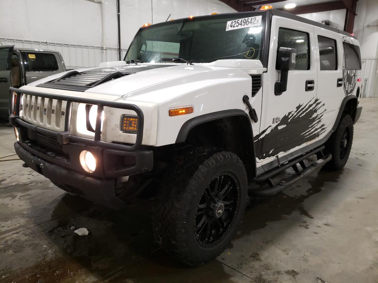 صورة رقم 2 من المزاد - 2003 HUMMER H2 مع VIN 5GRGN23U13H147734