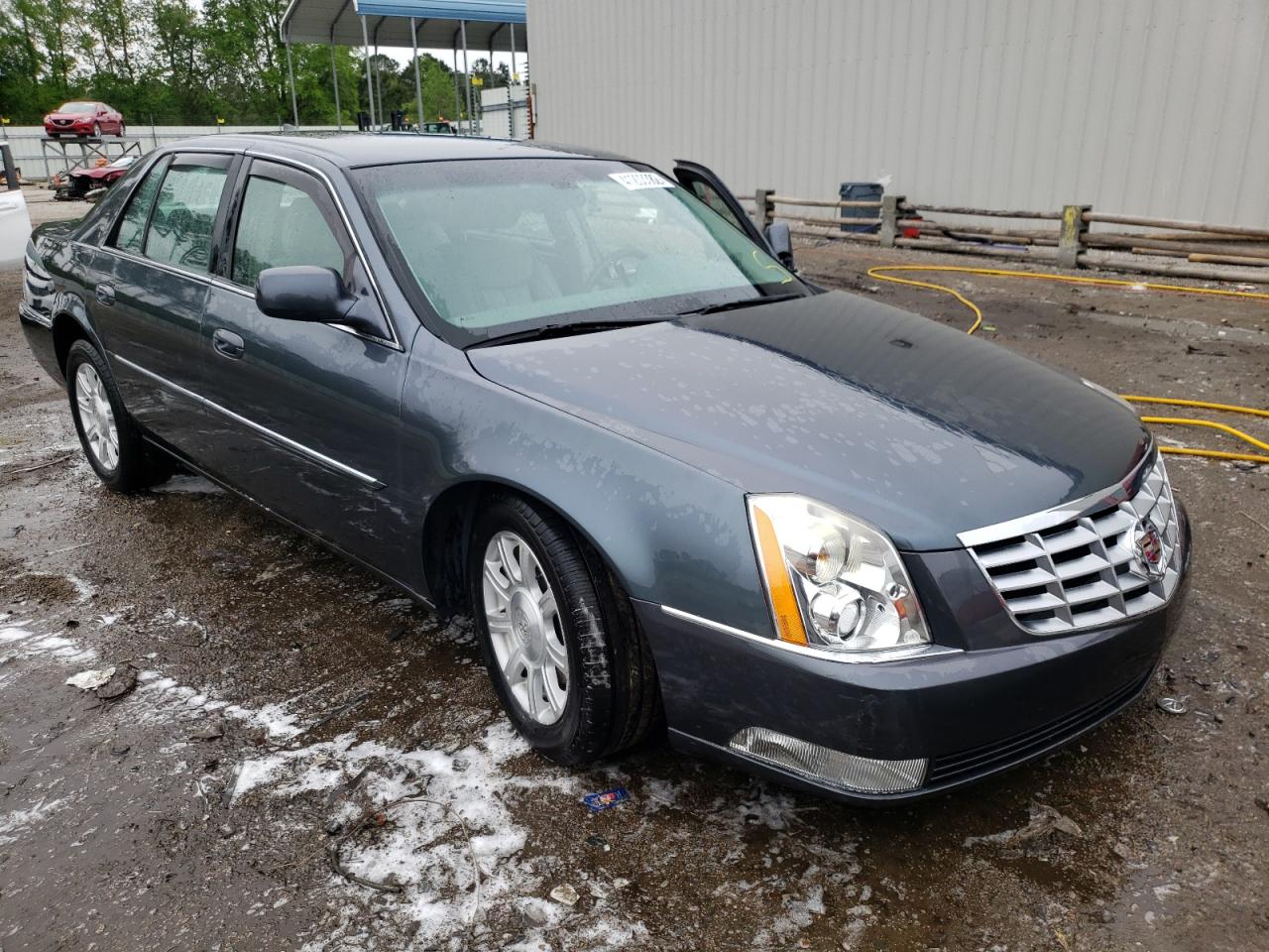 CADILLAC DTS 2011 with VIN 1G6KA5E61BU104995 - Photo from auction