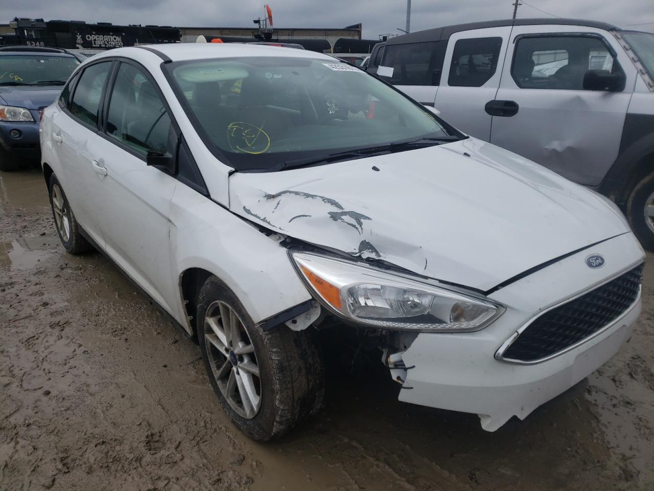 FORD FOCUS SE 2016 with VIN 1FADP3F21GL376387 - Photo from auction