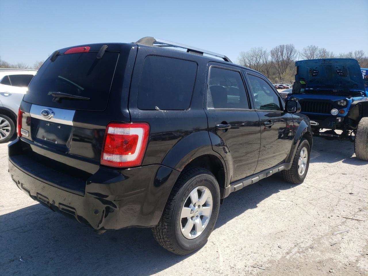 Photo 4 from auction – 2009 FORD ESCAPE LIM with VIN 1FMCU04739KB34197