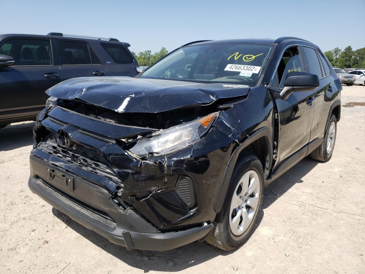 Photo 2 from auction – 2019 TOYOTA RAV4 LE with VIN JTMH1RFV9KJ008652