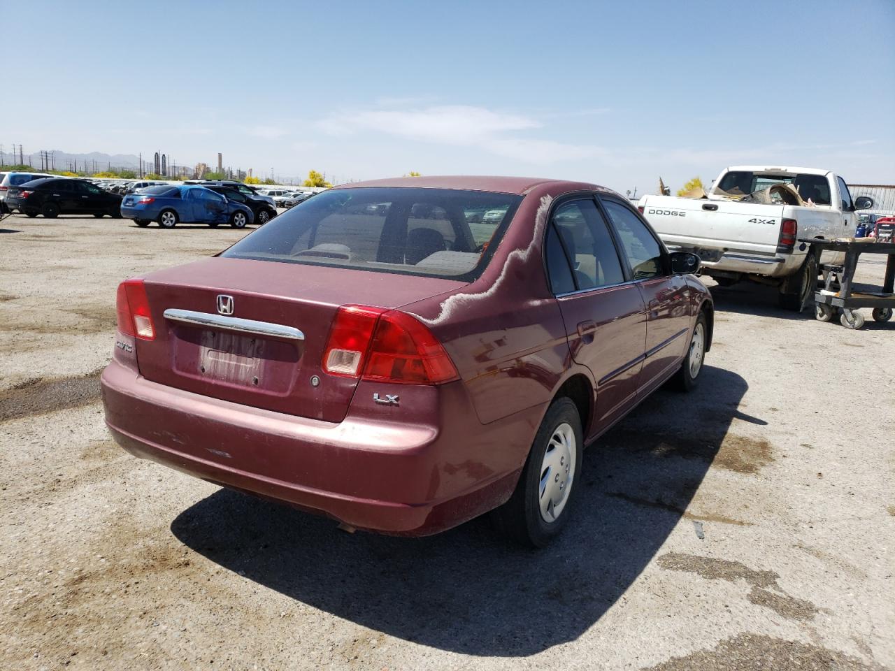 Photo 4 from auction – 2002 HONDA CIVIC LX with VIN 1HGES15582L045202