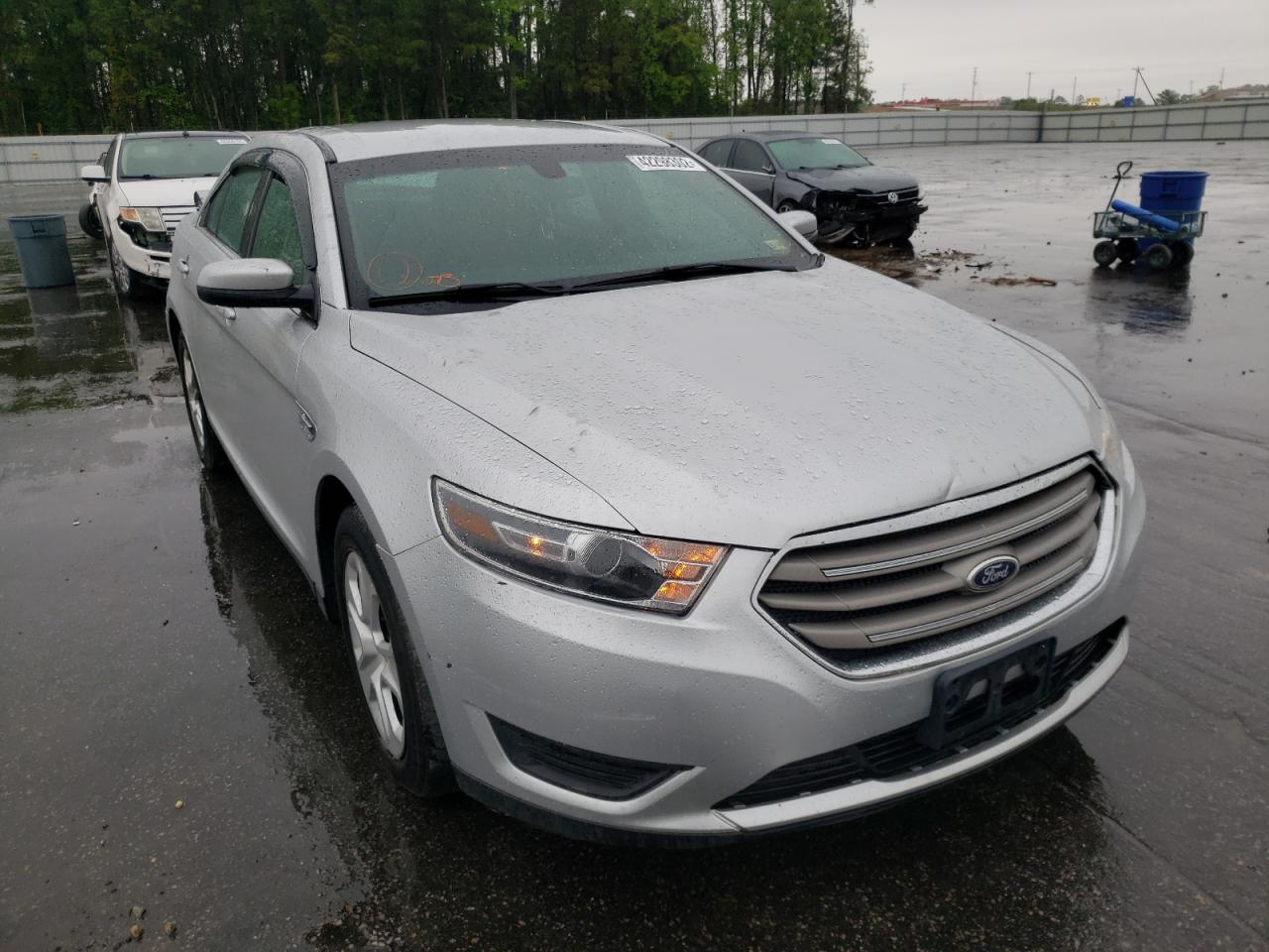 FORD TAURUS SEL 2016 with VIN 1FAHP2E89GG112831 - Photo from auction