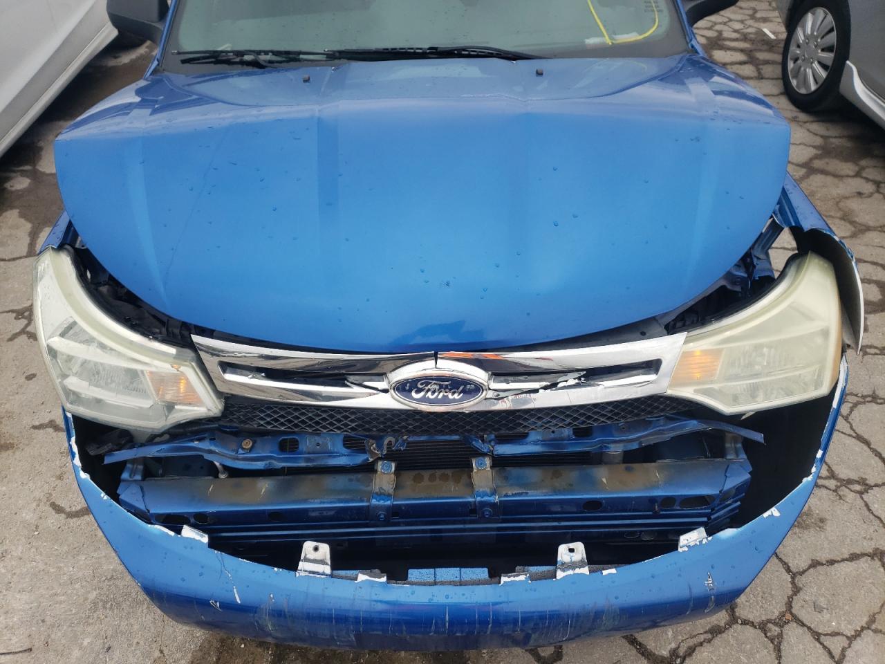 Photo 7 from auction – 2011 FORD FOCUS SE with VIN 1FAHP3FN9BW142338